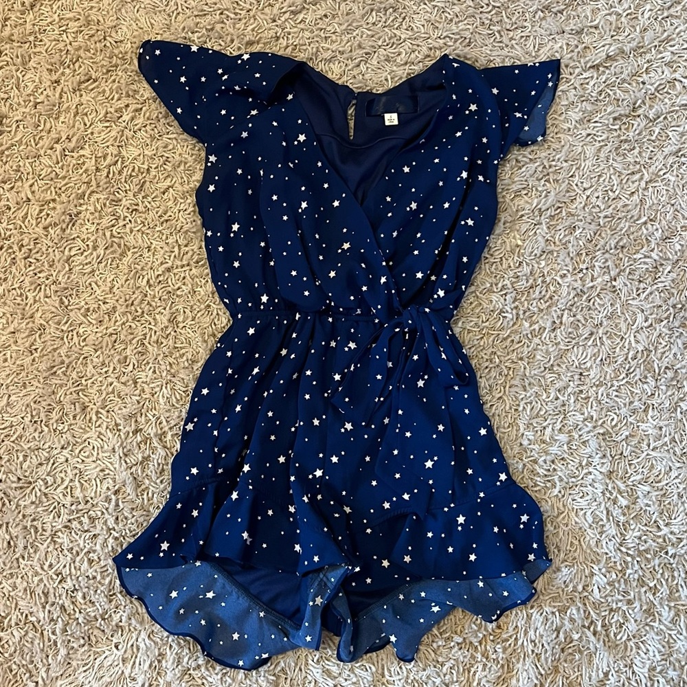 Navy blue romper with white stars
